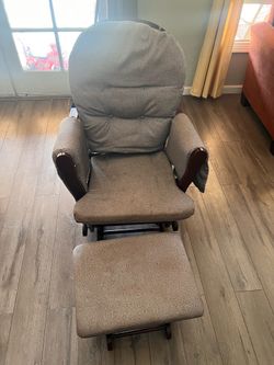 Glider with foot rest