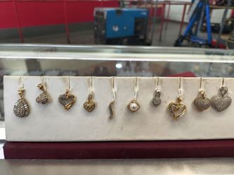 1410k gold diamond pendant different prices and grams layaway available 10% Dwon if you interested please make sure you ask for Maribel thank you