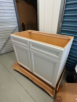 New in box white bathroom vanity with two doors