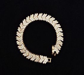 BRAZALETE  DE  ORO  LAMINADO/GOLD-PLATED  BRACELET 