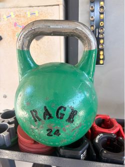 green, cast-iron Rage Fitness competition kettlebell  24 kilos 52 pounds