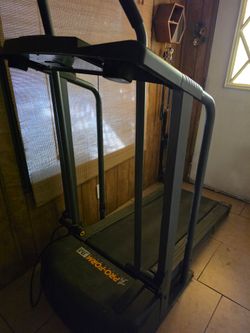 Treadmill, electric, folded down and  up