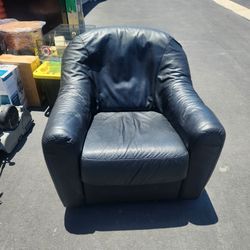 2 black leather  swivel chairs