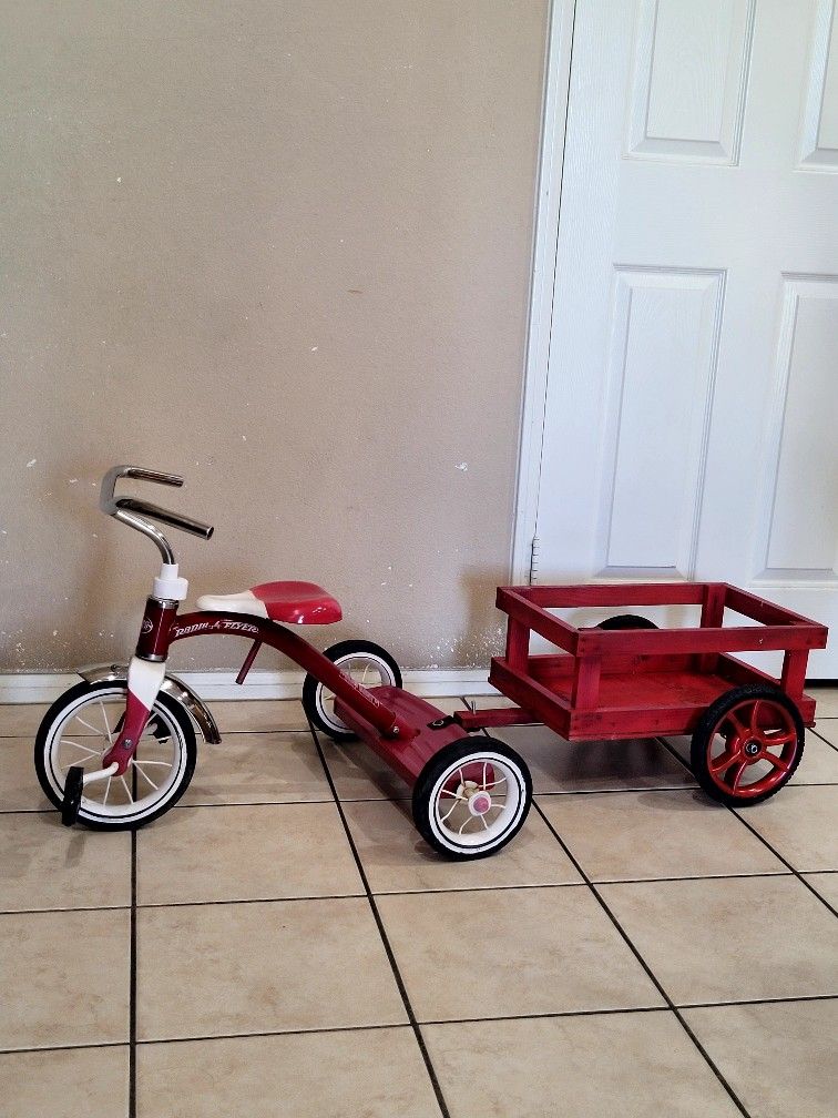 wheel antique tricycle with wagon attached