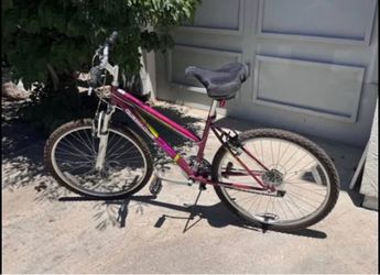 Pink Mountain Bike with Yellow Accents