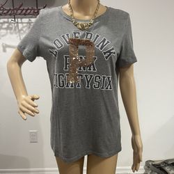 Victoria’s Secret Pink Bling Short Sleeve Tee, Size Medium, used has been worn and washed, may have some lint.  Pet Free Smoke Free Home