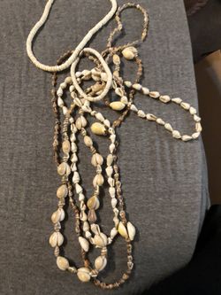 Pooka shells! Have a bracelet and 4 Hawaiian necklaces
