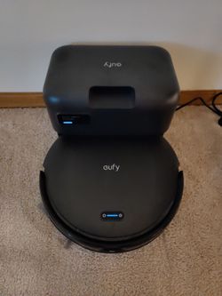 Robot Vacuum with Self Emptying Feature