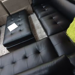 *Summer Of Sectionals*---Ibiza Sleek Black Leather Sectional Sofa W/Ottoman---Delivery And Easy Financing Available 