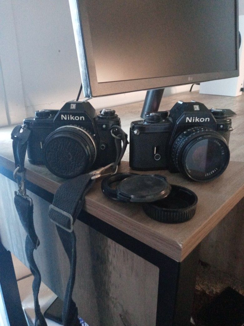 2 Used Nikon Em 50mm Lens Camera Offer Up For Both for Sale in