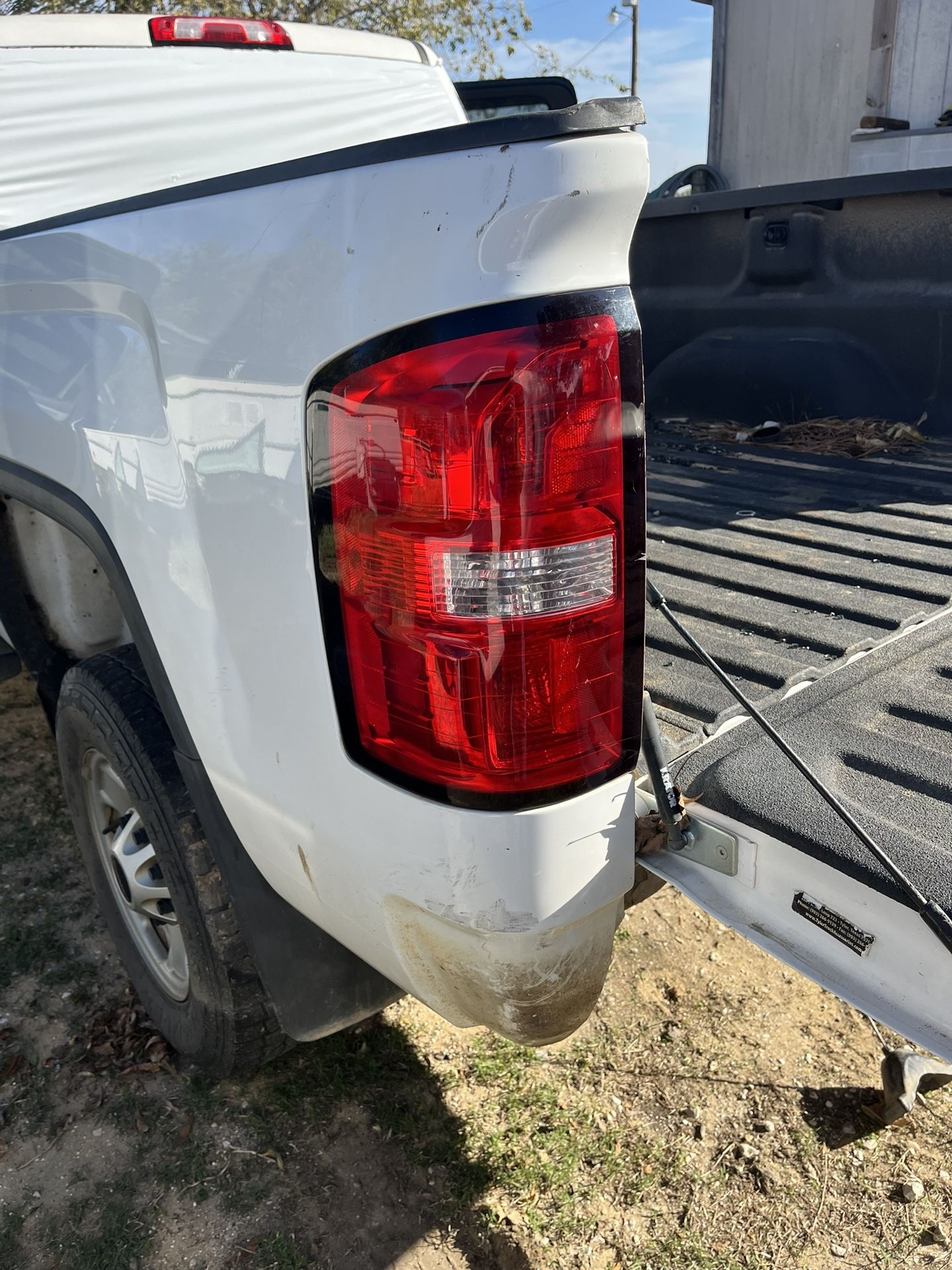 OEM.  GMC Sierra Tail Light 