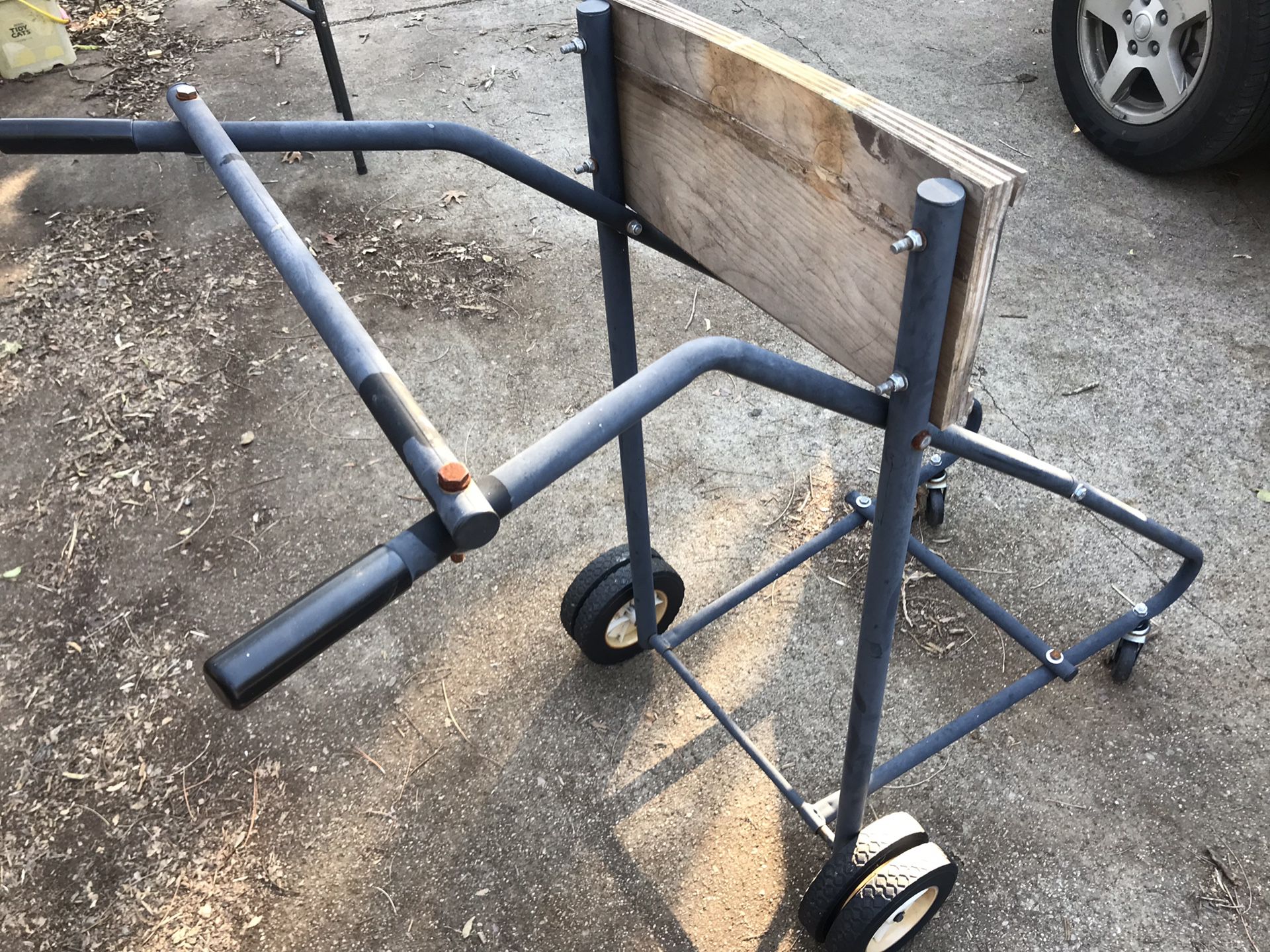Outboard motor stand/dolly