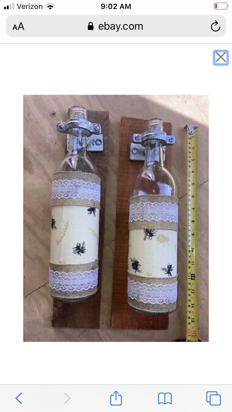 Reclaimed lumber and wine bottle wall decor