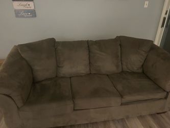 Gray sofa with bed
