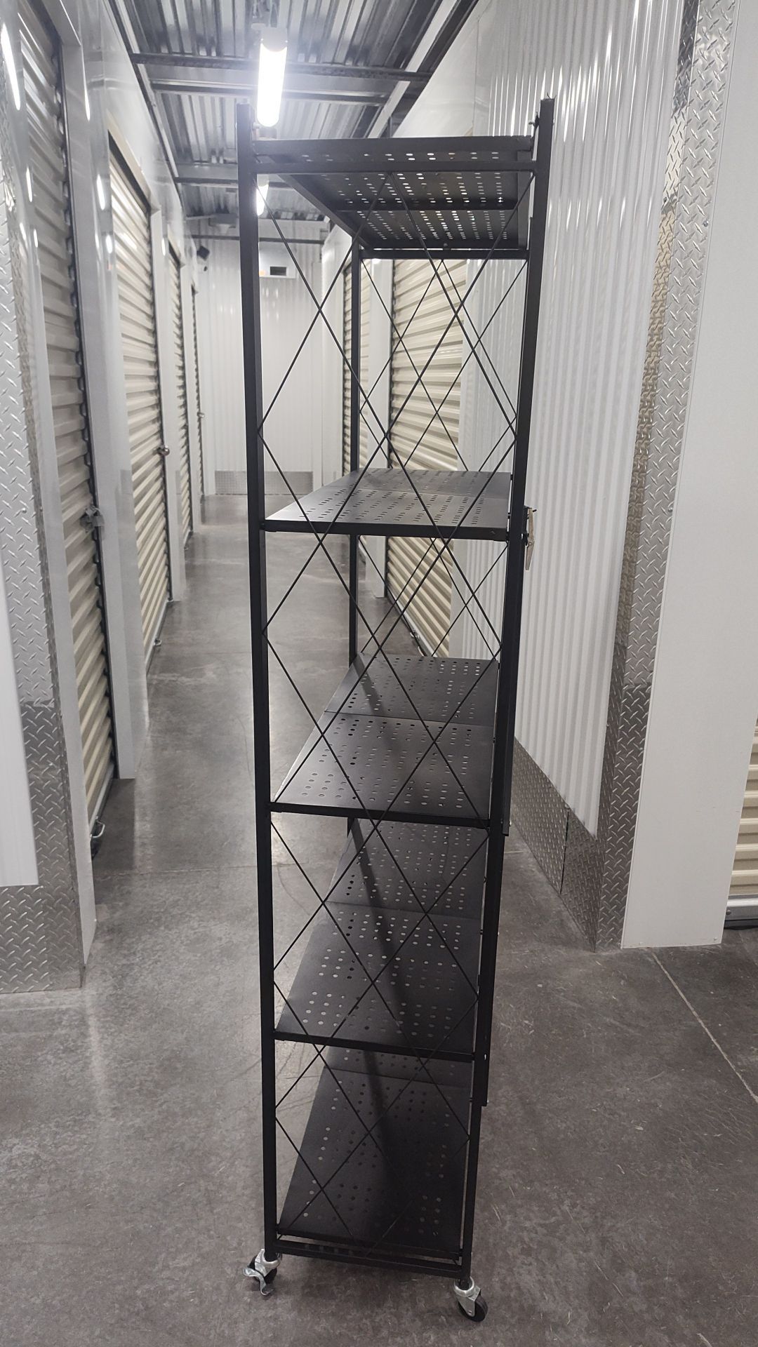 Folding metal shelves
