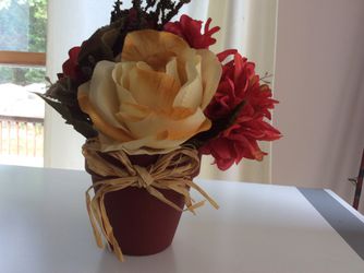 Silk flower arrangement in clay pot 10” tall
