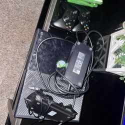Xbox one, 2 controllers, charger and 16 games