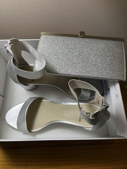 There Is Two item A Pair of shoes and little Silver clutch both for $35 the Shoes Is Size 7.5 