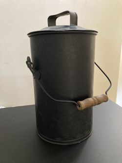 antique metal milk jug vase?