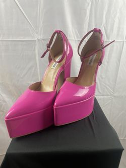 Pink Platform pumps by Steve Madden