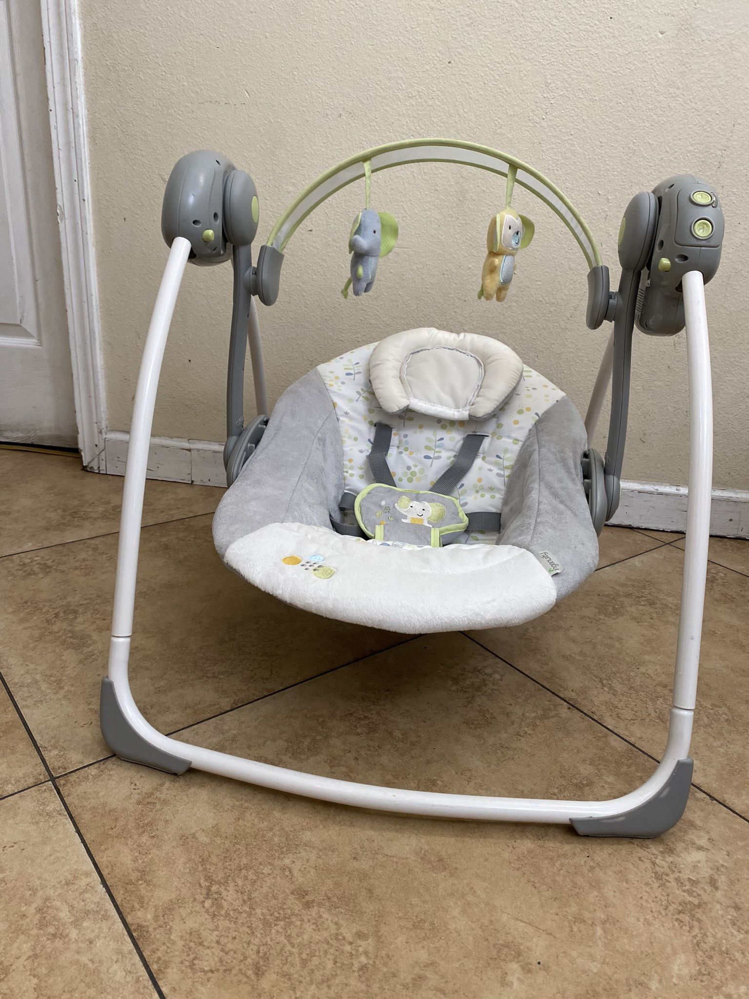 Ingenuity 6-Speed Portable Baby Swing with Music.