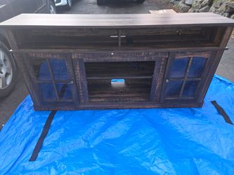 Assembled TV Stand.  Delivery Available For An Extra Fee