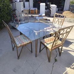 Like new indoor or outdoor dining table with 4 chairs