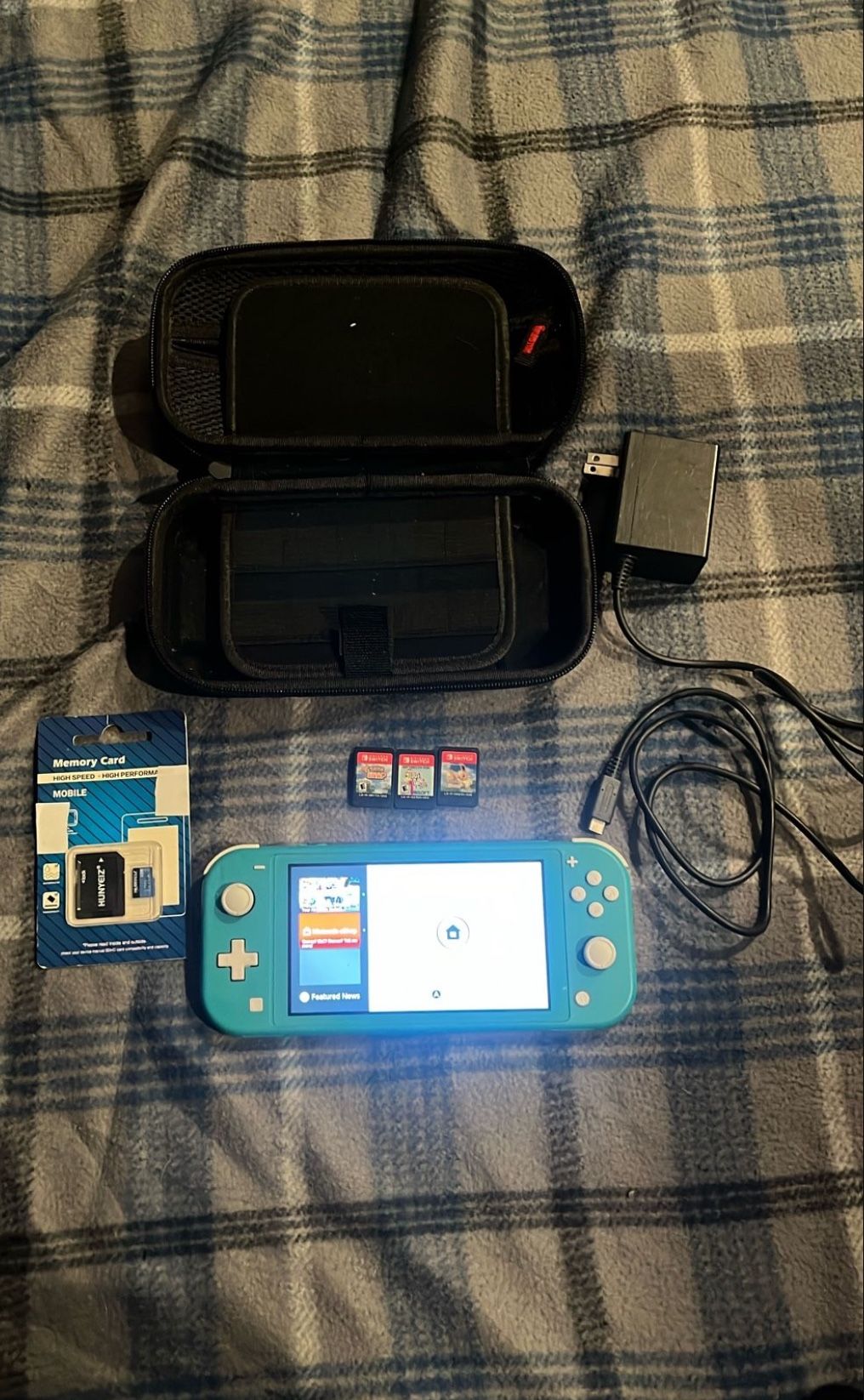 NINTENDO SWITCH LTE WITH GAMES,CARRYING CASE,MEMORY CARD AND CORDS