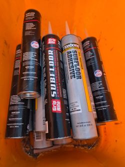 Subfloor adhesive and Coiled Strap