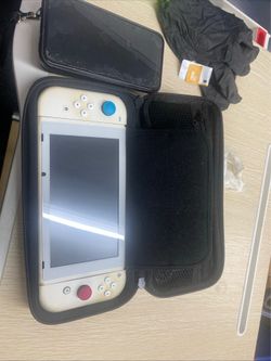 Nintendo Switch OLED Model Console with White Joy-Con, Carrying Case.