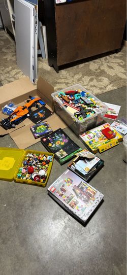 Large tub of legos, figures, containers