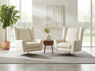 Pair of Restoration Hardware Luke Swivel Recliners