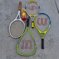 4 Tennis Rackets With 2 Tennis Balls 