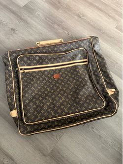 Vintage Louis Vuitton garment travel bag