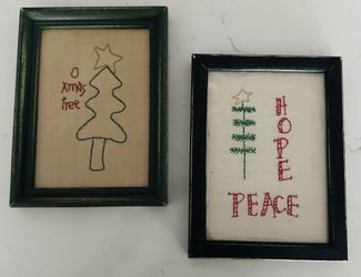 Set of 2  8”x6” vintage embroidered Christmas framed art. Dark green wood frames with Glass.