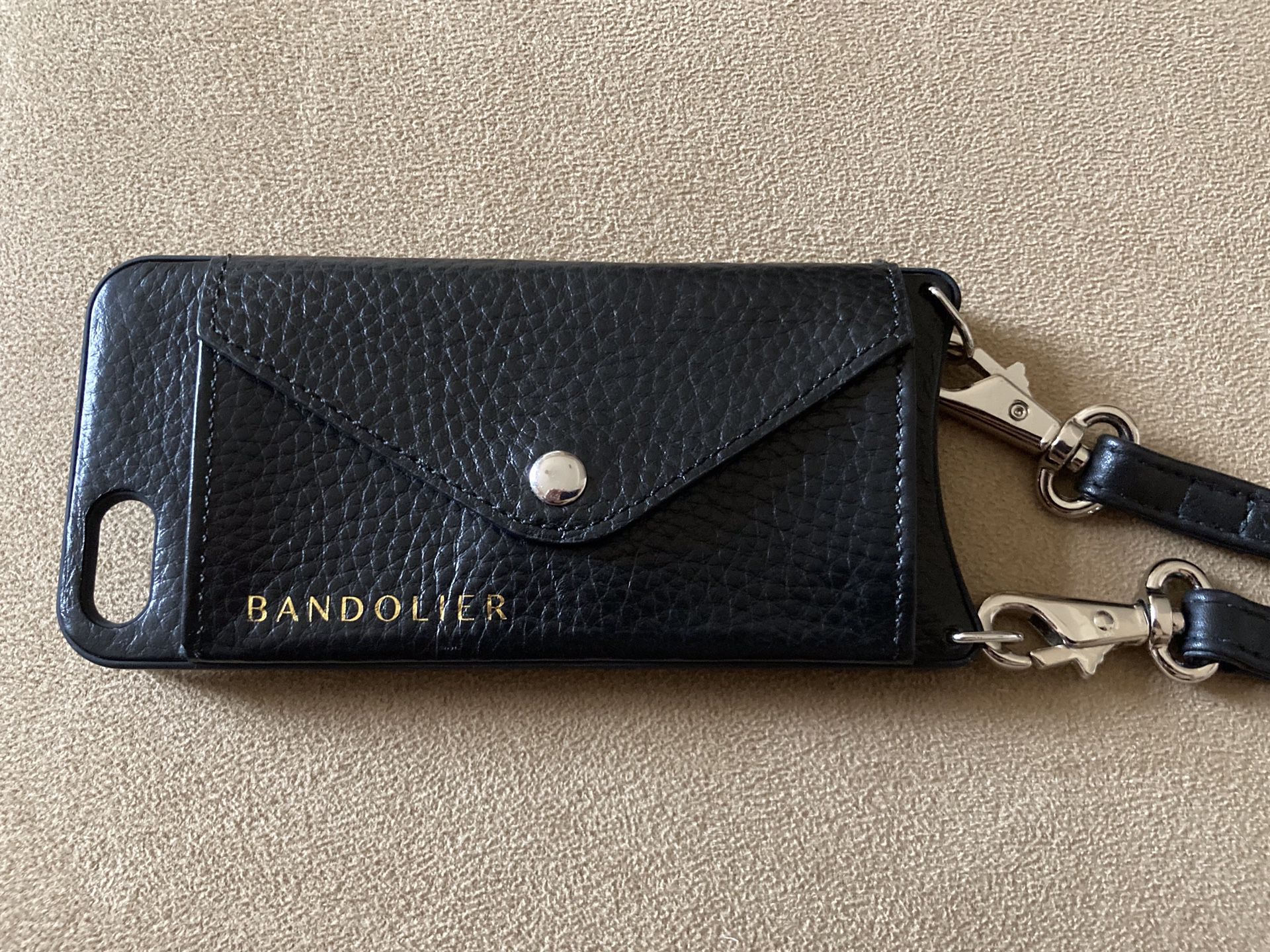 Bandolier IPhone 5/5s/SE 1st Edition Crossbody Side Pocket Case. Condition is Like New