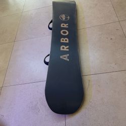 Men’s Burton step on boots with snowboard and carry on case