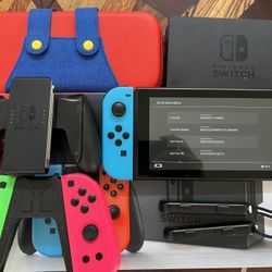 Nintendo Switch (with box) + extra Joycon & case