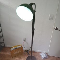 extendable light stand, with box $15