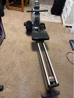 Merach Rowing Machine
