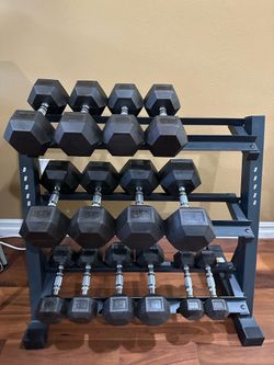 280-lb (from 5-35 lb) Rubber Coated Hex-shaped dumpbells set with rack. Like New