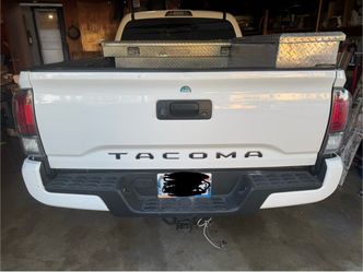 2023 white Tacoma Tailgate with anti-theft lock