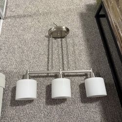1. Brushed Nickel 3-Light Pendant with White Drum Shades