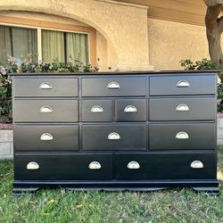 Black refinished 12 drawer dresser