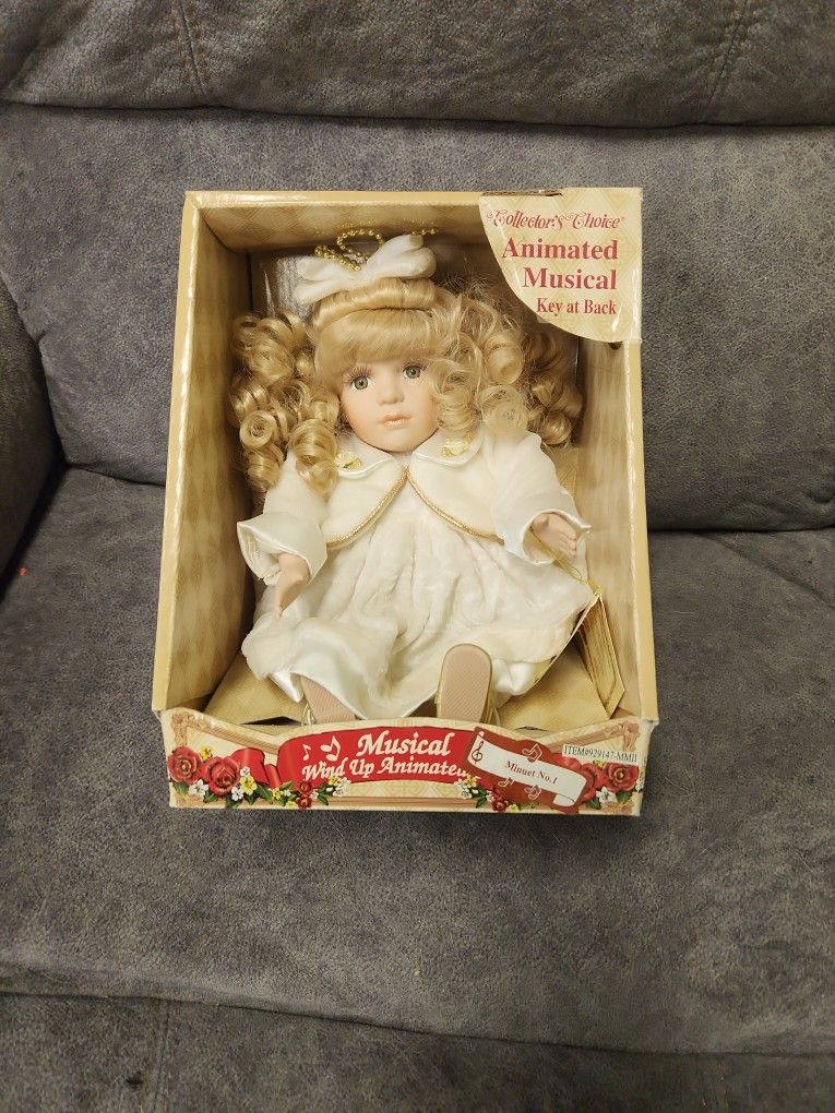 10 Inch Tall Porcelain Doll