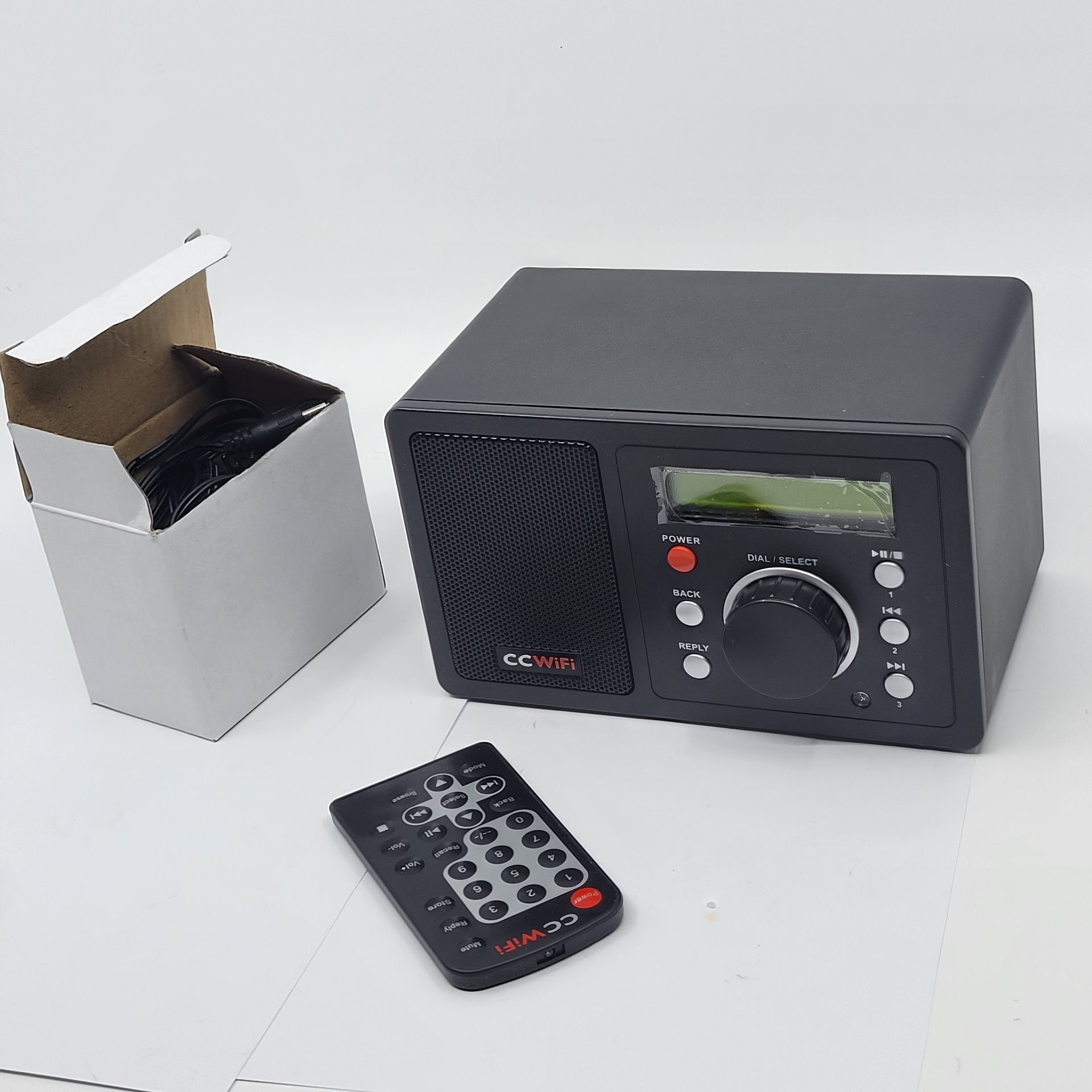 C. Crane CC WiFi Internet Radio , Clock and Alarm New Open box.Including power supply, remote, radio. Manual is missing.Weight 2lb plus shipping ma