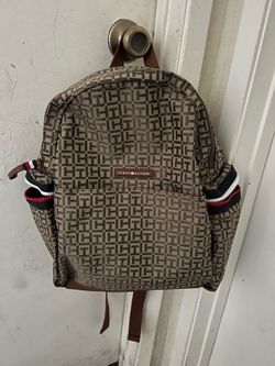 Tommy Hilfiger monogram backpack in new, unused condition.