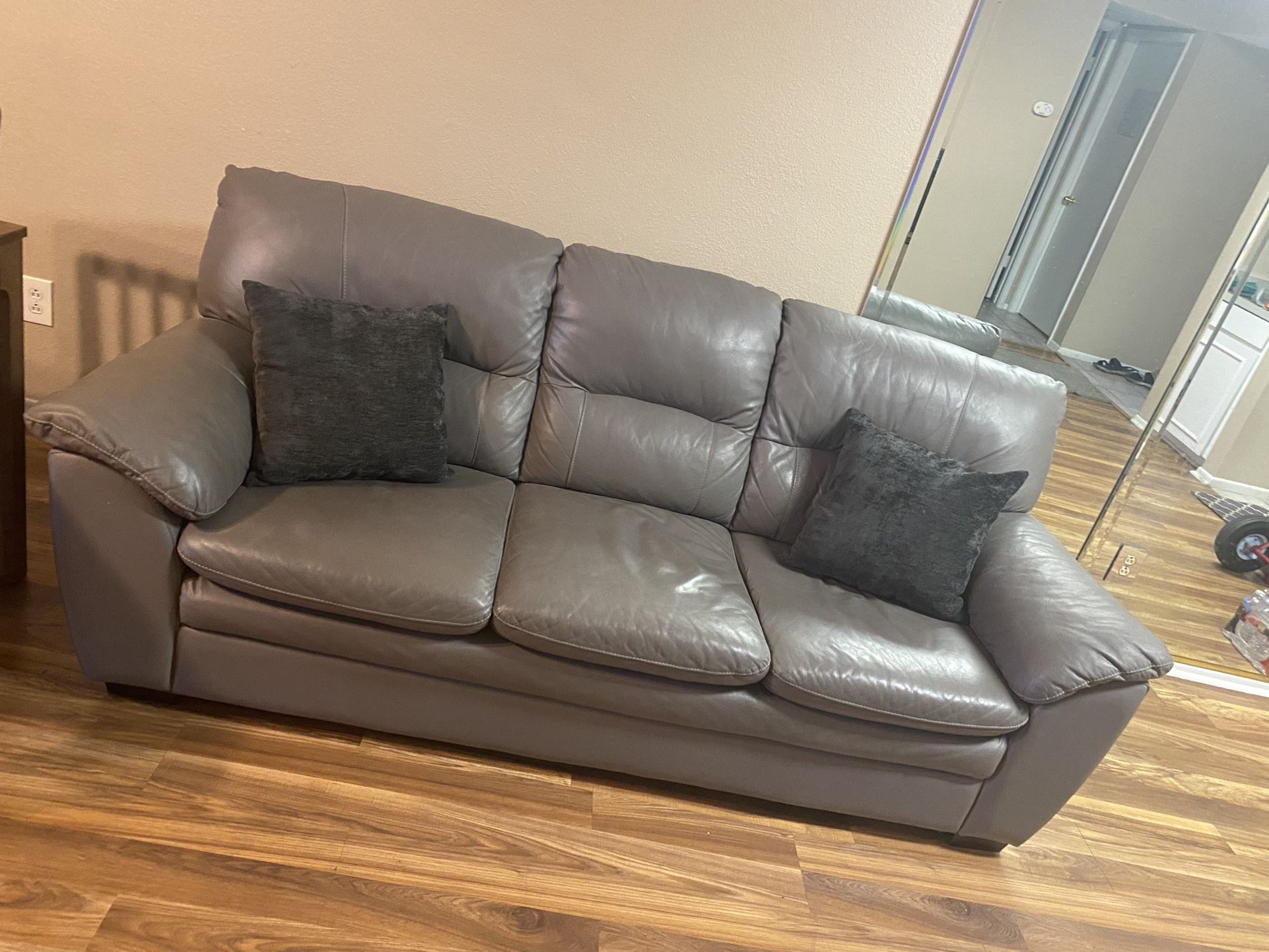 Comfortable Leather Couch (free delivery)