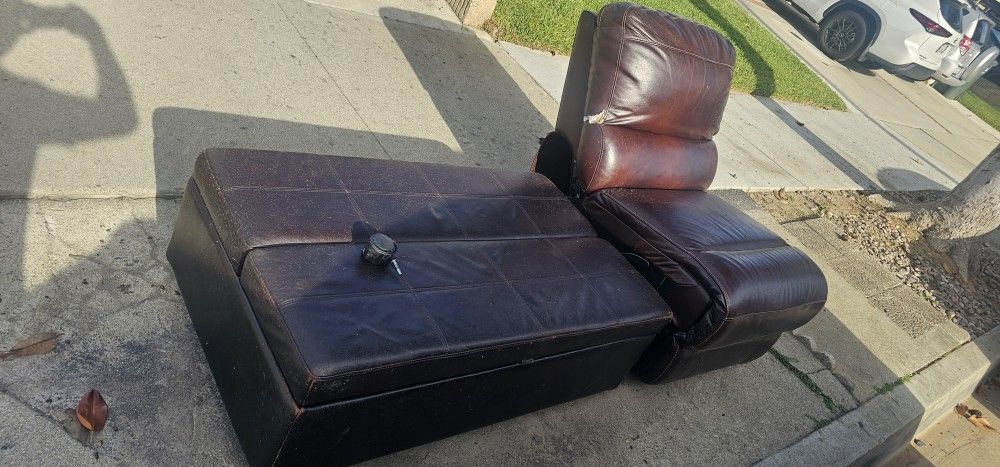 FREE LEATHER RECLINER AND FOLD OUT OTTOMAN BED