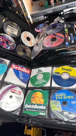 2 Big books of software CDS 💿 and some computer games $100 for all